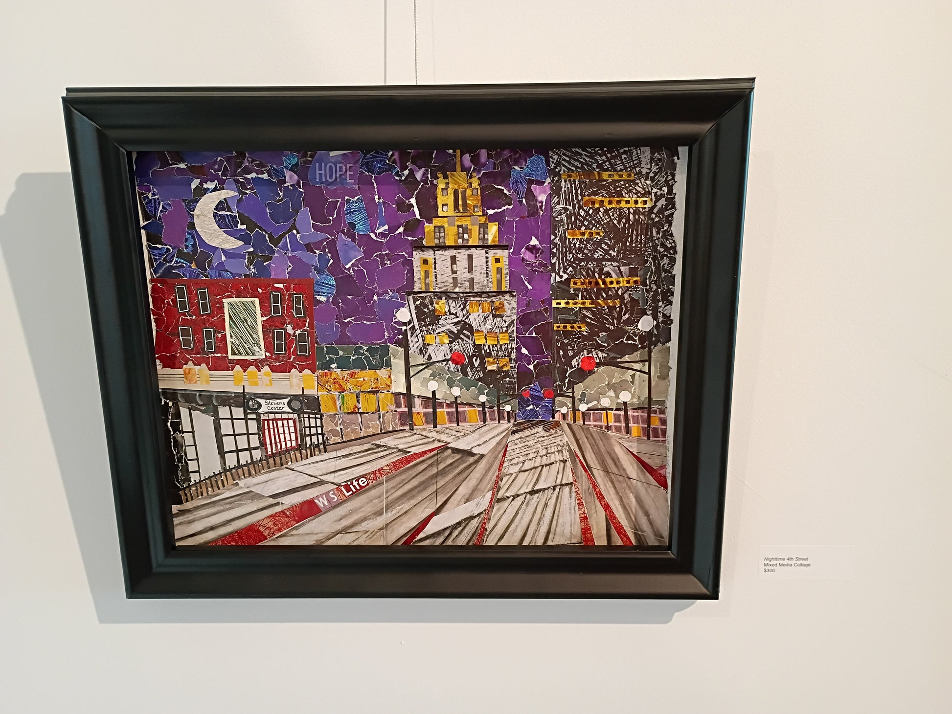 The original hanging in a gallery