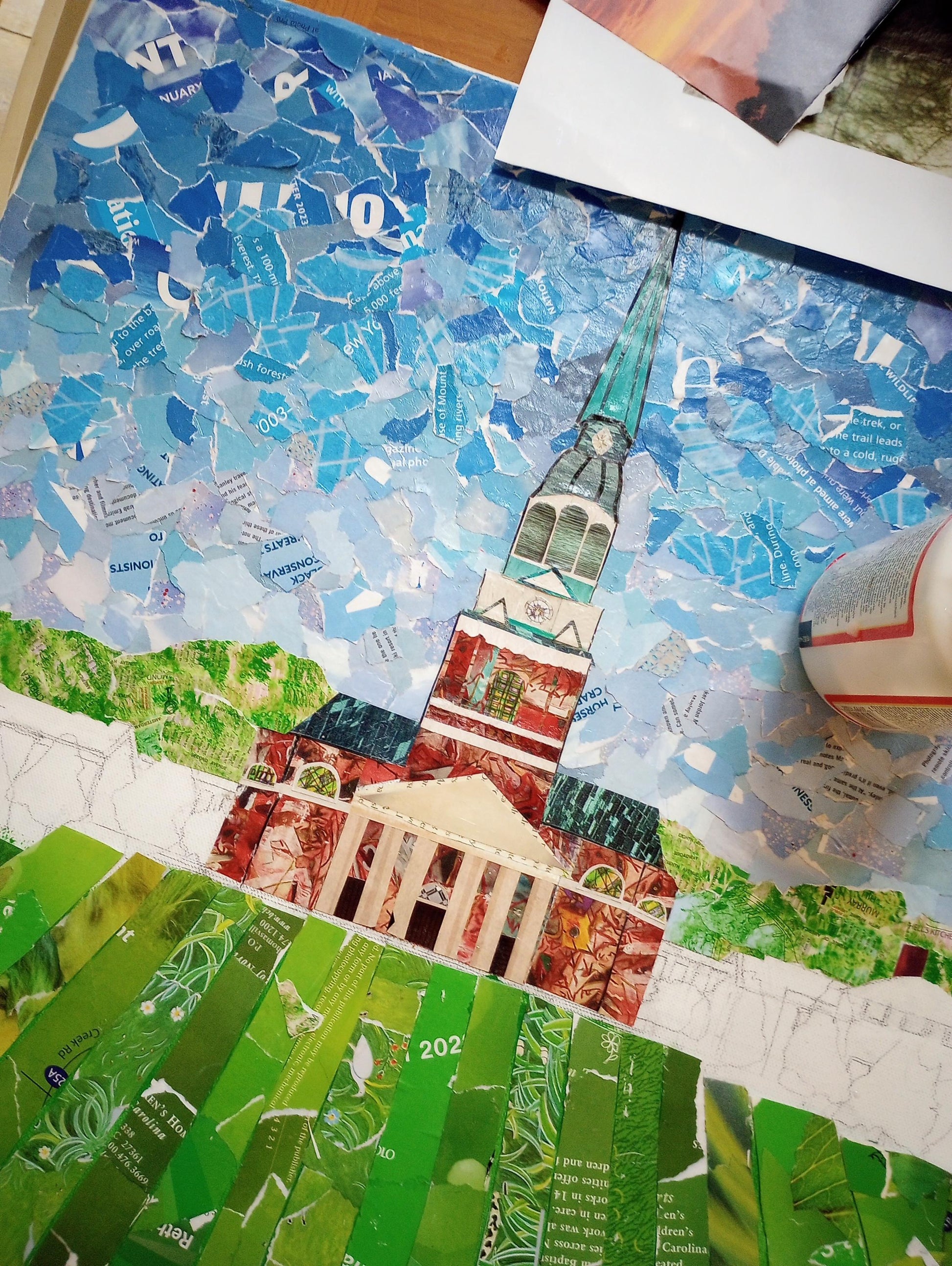 Collage of newspaper clippings with a focus on a building, using blue and green colors.