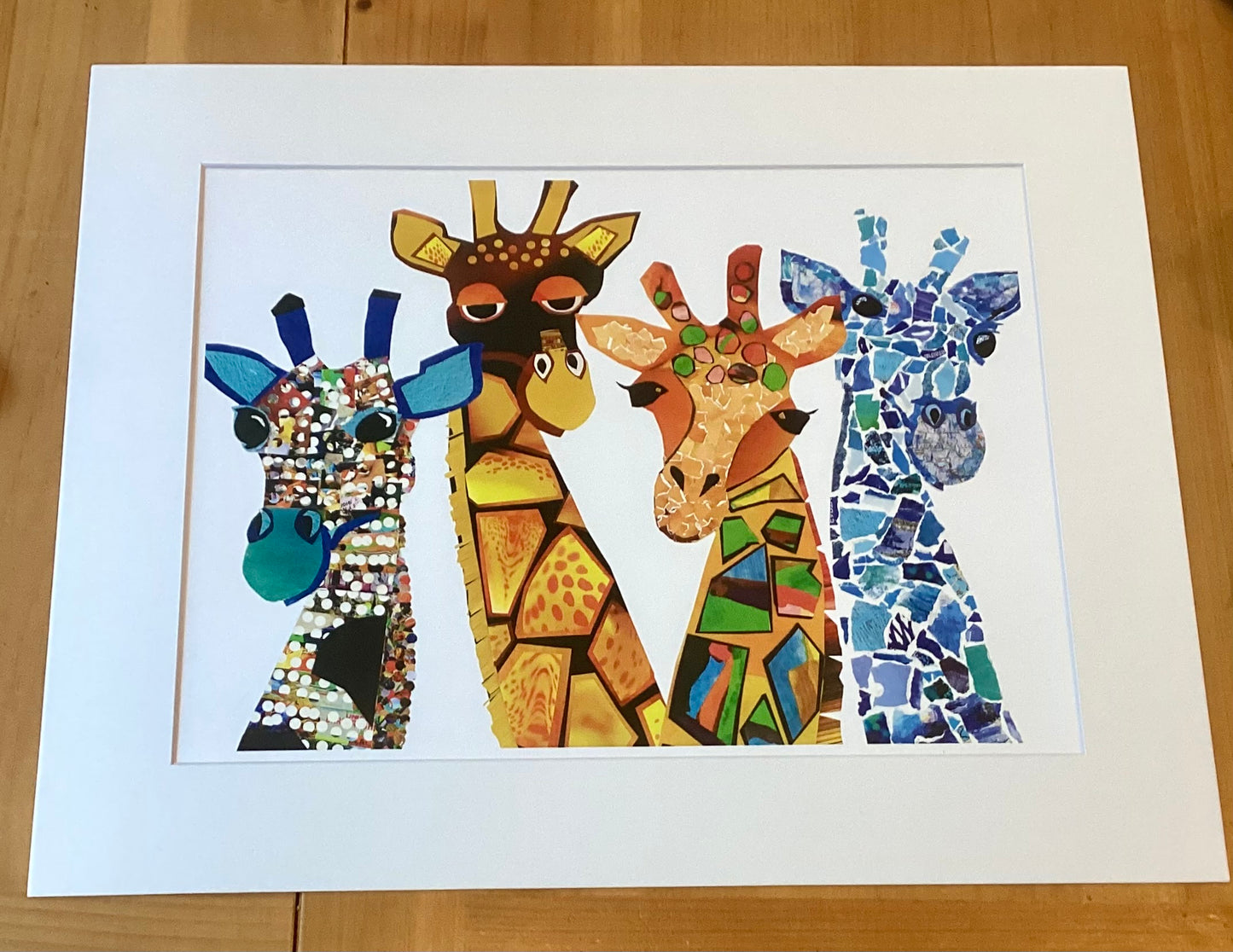 The Four Giraffateers, collage giraffes, colorful giraffes, the diversity of giraffes, giraffe art, torn paper giraffe print, unique giraffe