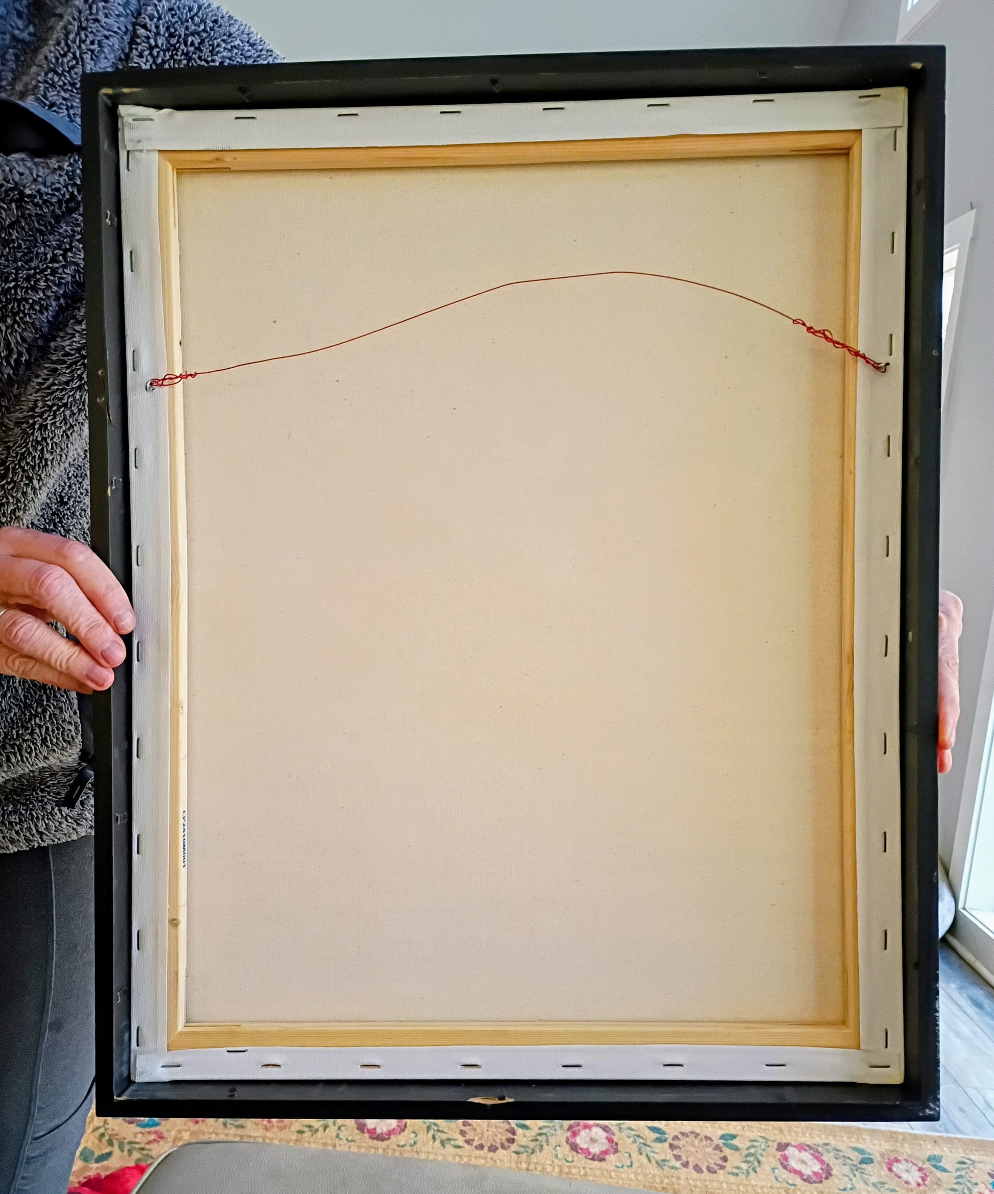 The back of the framed original