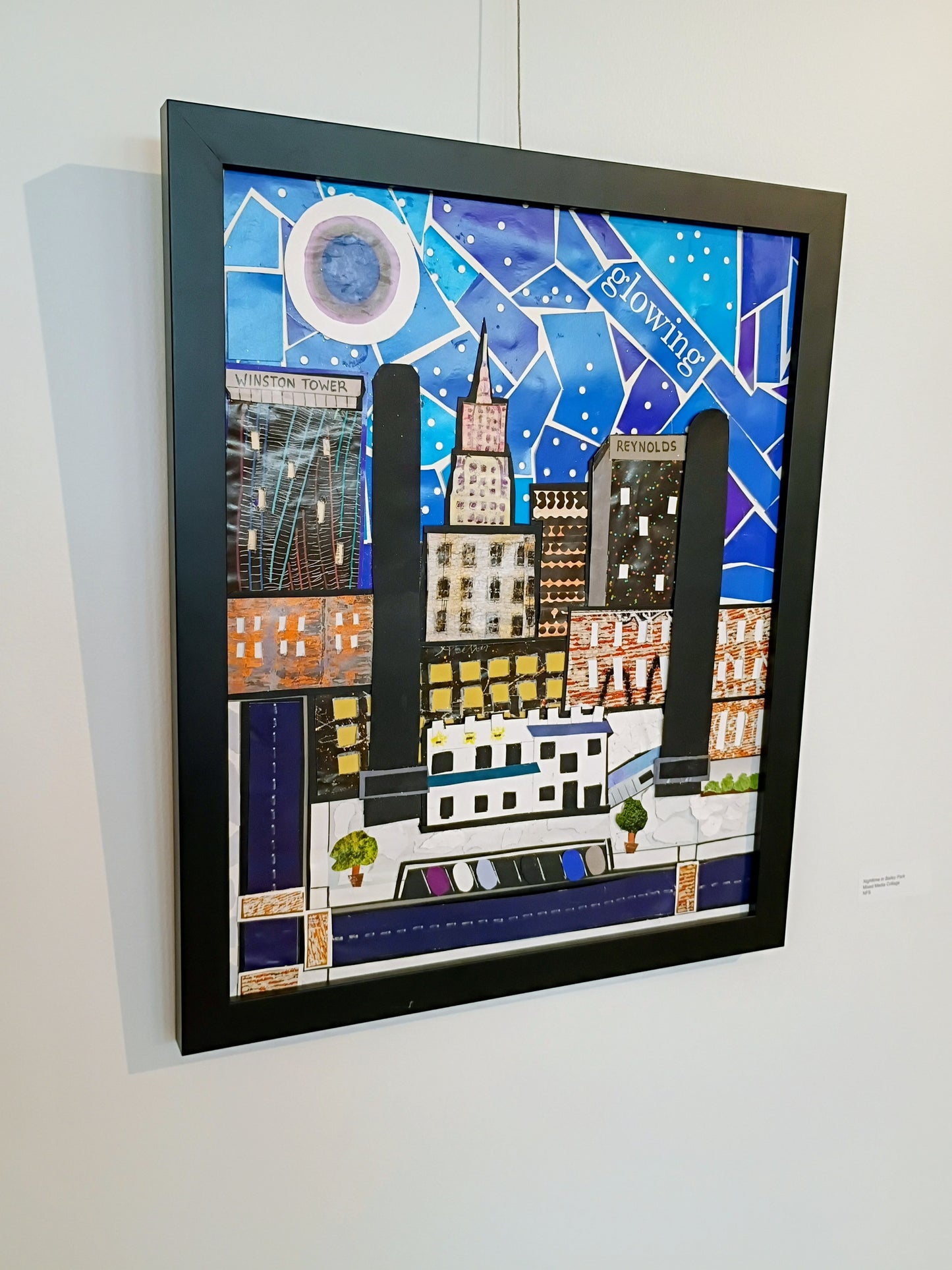 This is one of my first collages. It's a view of Bailey Park at night. The pieces are big and thus, there is not an outer varnish. It's raw and beautiful. This is sold in an open black frame $300. Ask me questions. 
